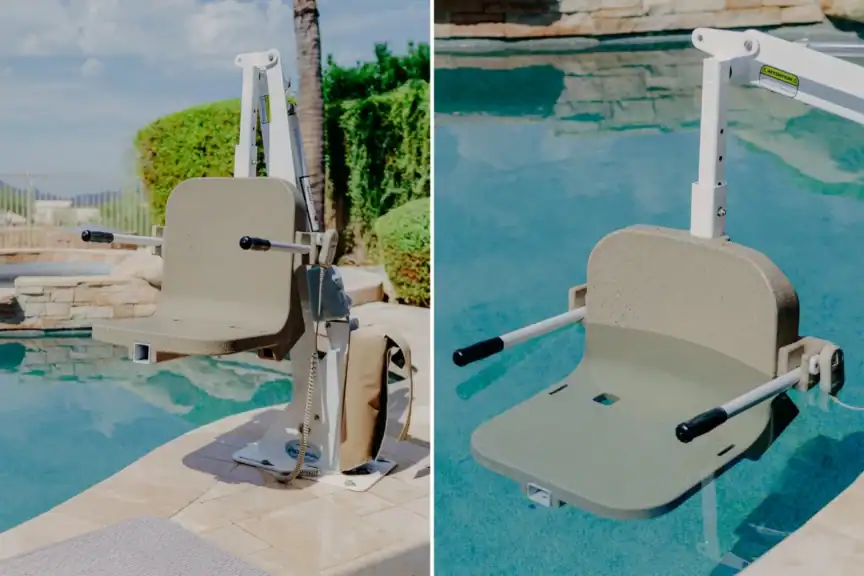 A pool lift chair with armrests and a mechanical base is installed at the edge of an outdoor swimming pool.
