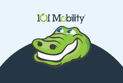 A cartoon alligator with a wide smile is centered beneath the 101 Mobility logo, which includes text and green arrows. The background is light blue with a dark blue arc at the bottom.