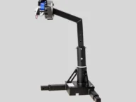 A black robotic arm with a blue motor on a stand, set against a gray background.