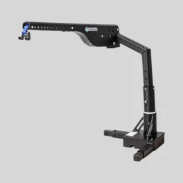 A black HamrA reacher/loader crane with a hook attachment, mounted on a base, viewed on a neutral background.