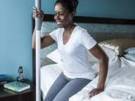 a woman using a HealthCraft SuperPole.