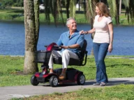 pride power scooter in red.