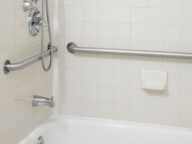 grab bars installed in a shower.