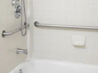 grab bars installed in a shower.