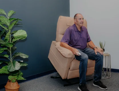 a man on a lift chair.