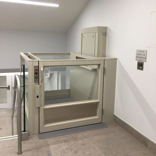 Savaria V-1504 vertical platform lift in a lobby.