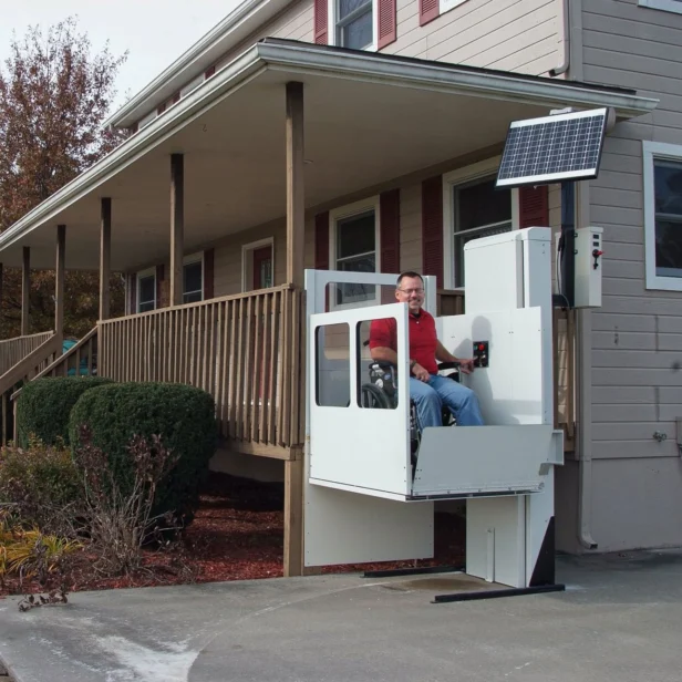 a patient using a SHC vertical platform lift.