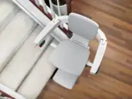 Overhead view of the Bruno Elan SRE-5000 stairlift seat, armrests and footrest