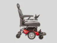 side view of a golden power chair in red.