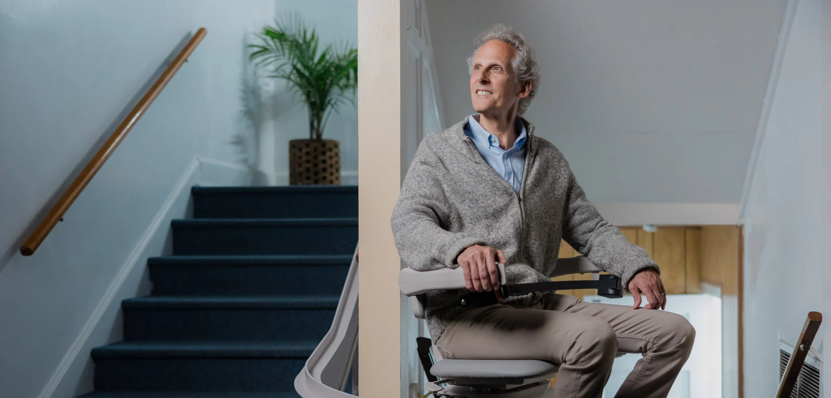 a man on a stairlift.
