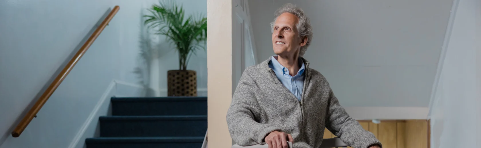 A man on a stairlift.