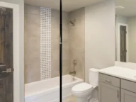 a stander pole installed in a bathroom.