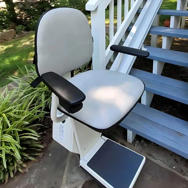 close up view of the seat on a staying home outdoor stairlift.