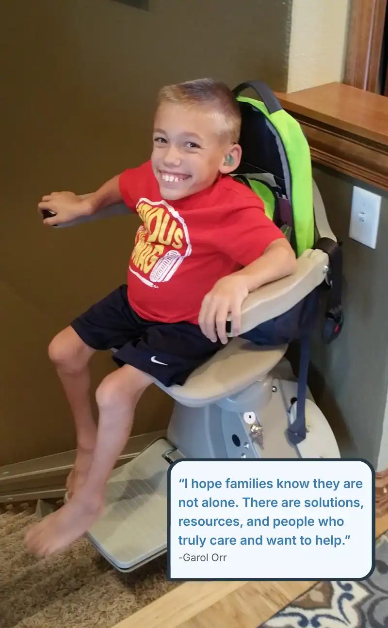 A smiling young boy sits on a stairlift with a green backpack. A quote about support for families appears at the bottom of the image.