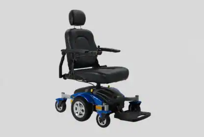 A blue and black electric wheelchair with a padded seat, headrest, armrests, and footrest, shown against a plain gray background.